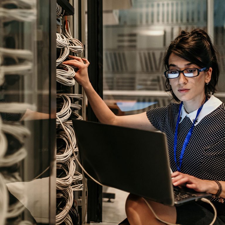 Woman plugging into server