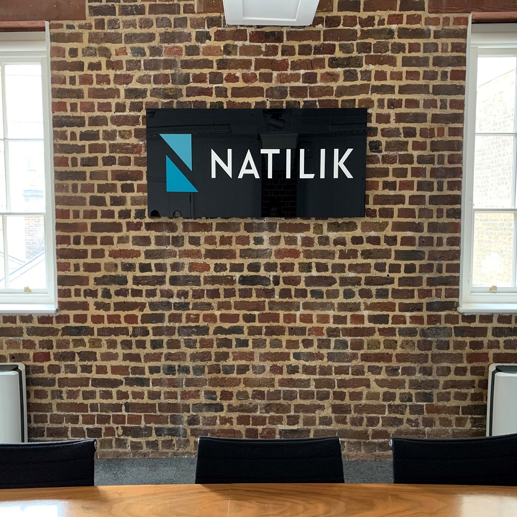 Natilik logo on office wall